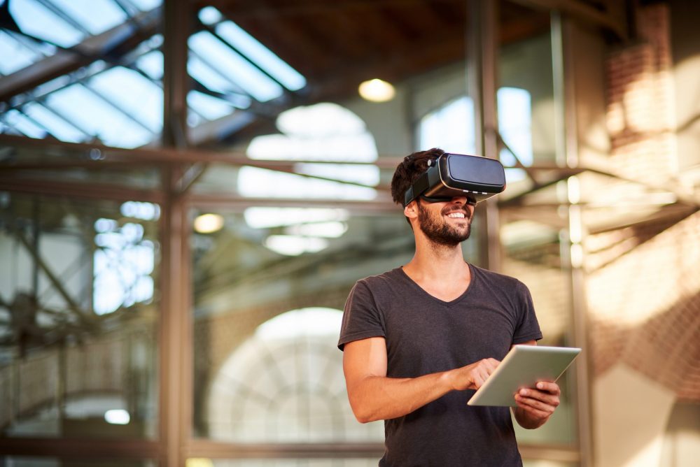 GettyImages 846842616 work design man in headset scaled e1727232916797